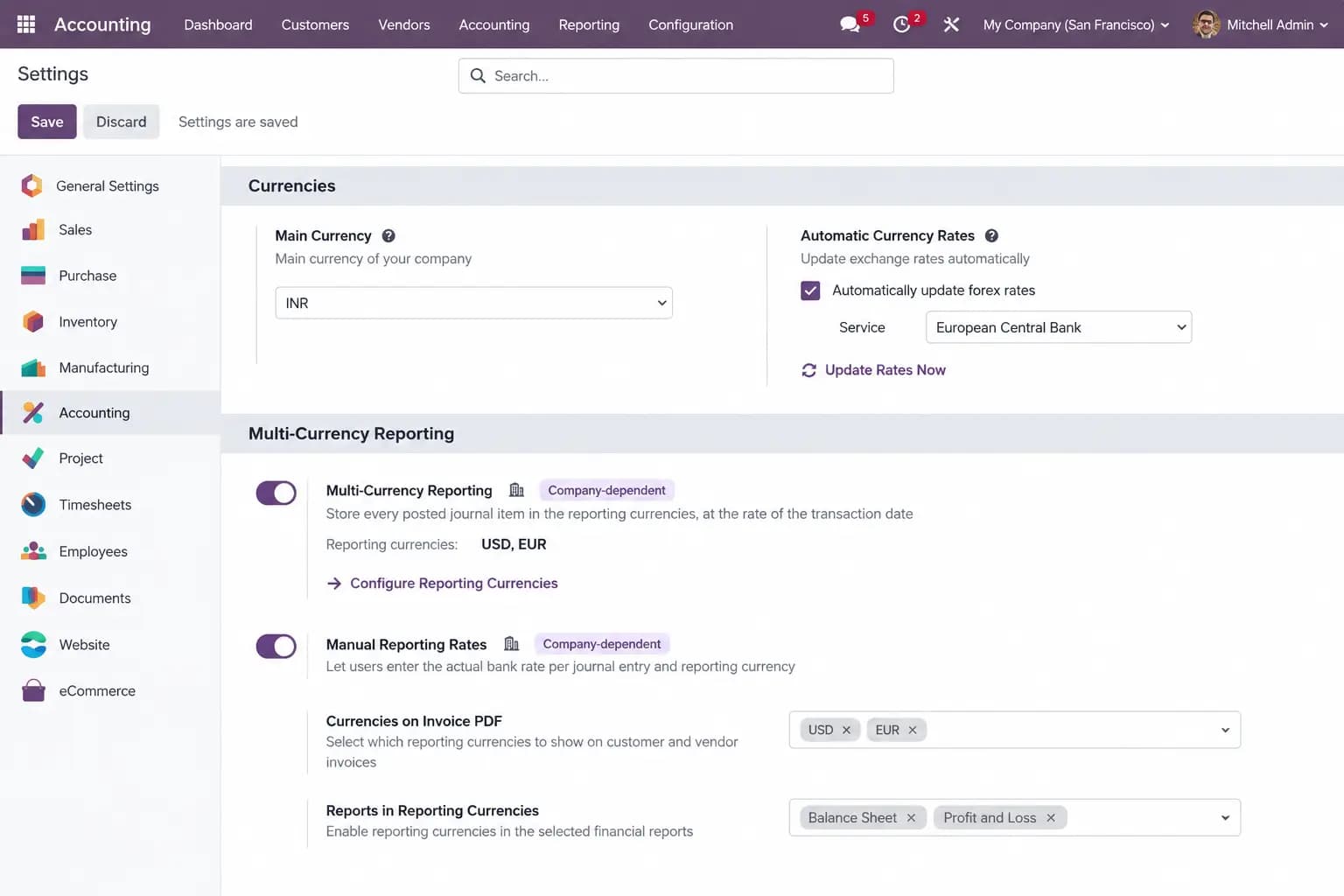 Odoo 19 Accounting settings — Multi-Currency Reporting block with USD and EUR enabled