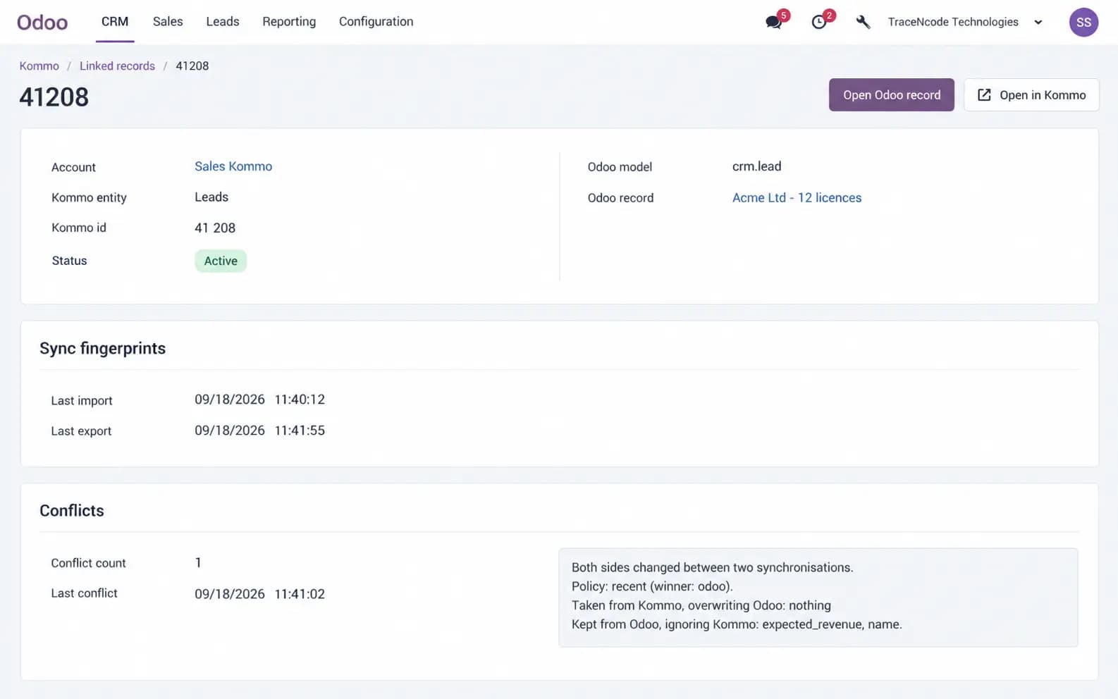 Linked Kommo record with sync fingerprints and conflict resolution